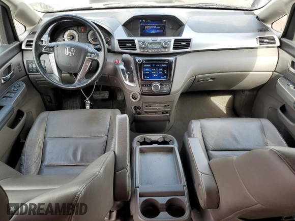 2014 Honda Odyssey Touring with VIN 5FNRL5H97EB097771, listed as a Copart auction lot 51664455 with 109,830 mi miles and Salvage Title. Bid and sale history available at DreamBid. Image 8.