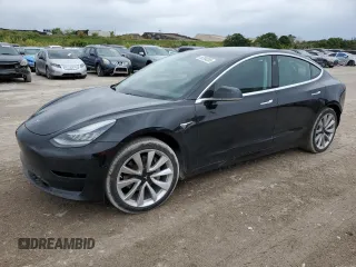 2019 Tesla Model 3 Mid Range with VIN 5YJ3E1EA7KF412426, listed as a Copart auction lot 55204205 with 73,230 mi miles and Non Repairable. Bid and sale history available at DreamBid. Image 1.