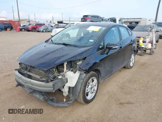 2018 Ford Fiesta SE z VIN 3FADP4BJ0JM139172, wystawiony jako IAAI lot #41212242 z przebiegiem 160 238 mil mil oraz . Historia ofert i sprzedaży dostępna na DreamBid. Obrazek 2.