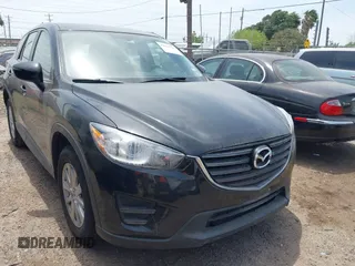2016 Mazda CX-5 Sport z VIN JM3KE2BY8G0847018, wystawiony jako IAAI lot #42064726 z przebiegiem 69 017 mil mil oraz . Historia ofert i sprzedaży dostępna na DreamBid. Obrazek 1.