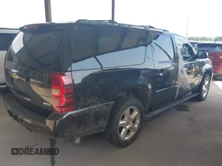 2008 Chevrolet Suburban LTZ with VIN 1GNFK16328R161721, listed as a IAAI auction lot 42130017 with 242,266 mi miles. Bid and sale history available at carsss.com. Image 4.