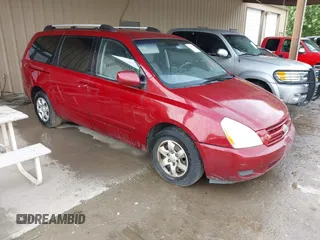 2009 Kia Sedona LX with VIN KNDMB233X96277536, listed as a IAAI auction lot 42108653 with 260,258 mi miles. Bid and sale history available at carsss.com. Image 1.