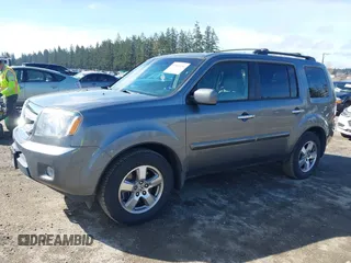 2009 Honda Pilot EX-L with VIN 5FNYF48529B035811, listed as a IAAI auction lot 41883686 with 173,830 mi miles. Bid and sale history available at carsss.com. Image 2.