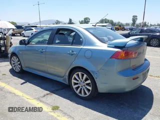 2008 Mitsubishi Lancer GTS z VIN JA3AU86U38U021896, wystawiony jako IAAI lot #42294311 z przebiegiem 188 937 mil mil oraz . Historia ofert i sprzedaży dostępna na DreamBid. Obrazek 3.
