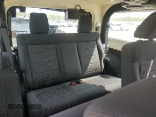 2011 Jeep Wrangler Sport with VIN 1J4AA2D15BL574234, listed as a Copart auction lot 52952605 with 114,642 mi miles and Salvage Title. Bid and sale history available at carsss.com. Image 10.