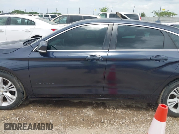 2014 Chevrolet Impala LT with VIN 2G1115SLXE9222573, listed as a IAAI auction lot 42119082 with 147,011 mi miles and . Bid and sale history available at DreamBid. Image 14.