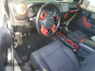 2011 Jeep Wrangler Unlimited Sport z VIN 1J4BA3H13BL592428, wystawiony jako Copart lot #52737075 z przebiegiem 246 737 mil mil oraz Szkoda całkowita • Salvage title. Historia ofert i sprzedaży dostępna na DreamBid. Obrazek 8.