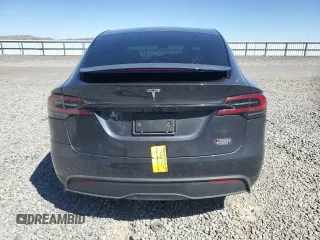 2023 Tesla Model X with VIN 7SAXCAE52PF380229, listed as a Copart auction lot 53535065 with 42,456 mi miles and Salvage Title. Bid and sale history available at DreamBid. Image 6.