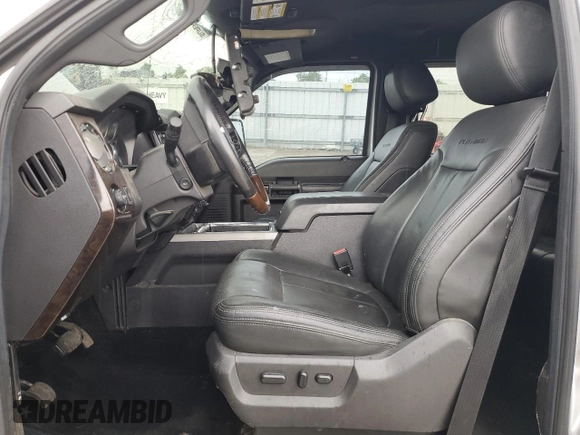 2014 Ford F-350 XLT with VIN 1FT8W3BTXEEA83246, listed as a Copart auction lot 56888075 with 188,928 mi miles and Salvage title. Bid and sale history available at DreamBid. Image 7.