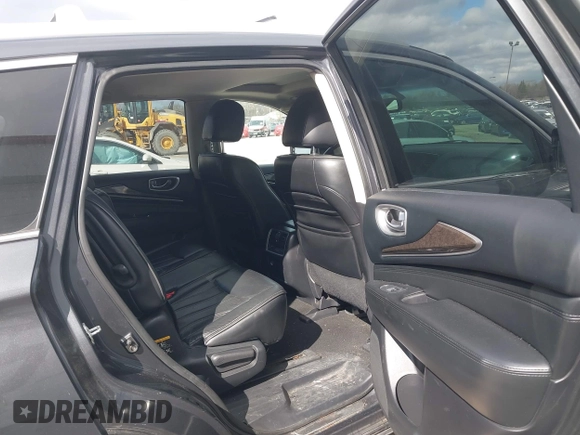 2013 Infiniti JX35 z VIN 5N1AL0MM2DC348245, wystawiony jako IAAI lot #41985096 z przebiegiem 130 127 mil mil oraz . Historia ofert i sprzedaży dostępna na DreamBid. Obrazek 8.