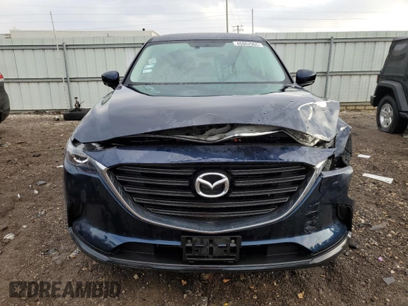 2017 Mazda CX-9 Sport with VIN JM3TCABY9H0142833, listed as a Copart auction lot 46862965 with 63,537 mi miles and Salvage Title. Bid and sale history available at DreamBid. Image 5.