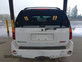 2003 GMC Envoy SLE with VIN 1GKDT13SX32319740, listed as a IAAI auction lot 41923578 with 210,811 mi miles. Bid and sale history available at carsss.com. Image 16.