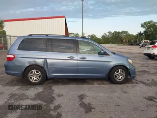 2007 Honda Odyssey EX-L z VIN 5FNRL38717B035384, wystawiony jako IAAI lot #41976861 z przebiegiem 211 640 mil mil oraz . Historia ofert i sprzedaży dostępna na DreamBid. Obrazek 13.