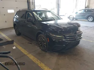 2023 Volkswagen Tiguan S with VIN 3VVRB7AX6PM069001, listed as a IAAI auction lot 41193316 with 21,586 mi miles and . Bid and sale history available at DreamBid. Image 1.