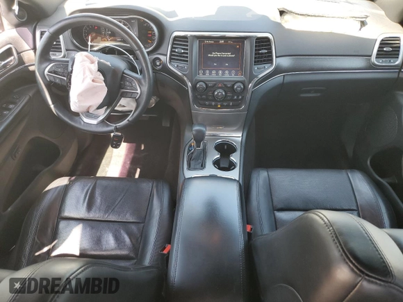 2018 Jeep Grand Cherokee Limited с VIN 1C4RJFBG6JC167657, выставлен на аукционе Copart как лот 52027435 с пробегом 68 802 миль миль и Списание • Salvage title. История ставок и продаж доступна на DreamBid. Изображение 8.