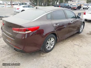 2016 Kia Optima LX with VIN 5XXGT4L30GG075759, listed as a IAAI auction lot 42024856 with 113,740 mi miles. Bid and sale history available at carsss.com. Image 4.