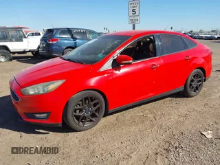 2016 Ford Focus SE with VIN 1FADP3F2XGL256037, listed as a IAAI auction lot 42047789 with 130,274 mi miles. Bid and sale history available at carsss.com. Image 2.