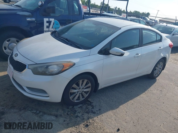 2014 Kia Forte LX with VIN KNAFX4A65E5204073, listed as a IAAI auction lot 42155914 with 167,079 mi miles and . Bid and sale history available at carsss.com. Image 2.