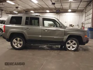 2012 Jeep Patriot Sport with VIN 1C4NJRBB1CD562668, listed as a IAAI auction lot 42463536 with 236,301 mi miles and . Bid and sale history available at DreamBid. Image 14.