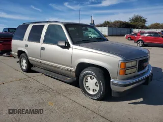 1999 GMC Yukon with VIN 1GKEC13R3XJ806033, listed as a Copart auction lot 80365934 with 154,984 mi miles and Clean Title. Bid and sale history available at carsss.com. Image 4.