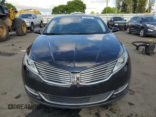 2016 Lincoln MKZ z VIN 3LN6L2G97GR614647, wystawiony jako Copart lot #55955655 z przebiegiem 142 655 mil mil oraz Szkoda całkowita • Salvage title. Historia ofert i sprzedaży dostępna na DreamBid. Obrazek 5.