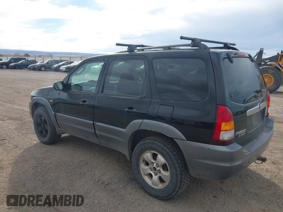 2001 Mazda Tribute LX with VIN 4F2CU08191KM27990, listed as a IAAI auction lot 41487001 with 209,394 mi miles and . Bid and sale history available at carsss.com. Image 3.