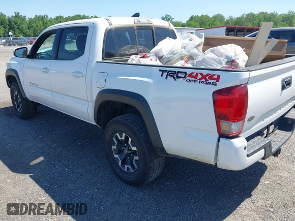 2016 Toyota Tacoma SR with VIN 3TMCZ5AN0GM003224, listed as a IAAI auction lot 42289910 with 140,899 mi miles and . Bid and sale history available at DreamBid. Image 3.