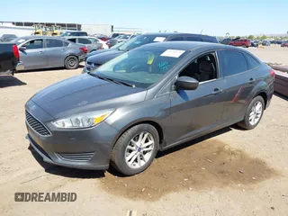 2018 Ford Focus SE with VIN 1FADP3FE6JL270910, listed as a IAAI auction lot 42130371 with 121,240 mi miles. Bid and sale history available at carsss.com. Image 17.