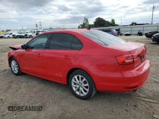 2015 Volkswagen Jetta SE with VIN 3VWD17AJ9FM220688, listed as a Copart auction lot 58270015 with 106,001 mi miles and Salvage title. Bid and sale history available at DreamBid. Image 2.