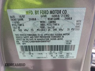 2008 Ford Escape Hybrid z VIN 1FMCU49H88KB89767, wystawiony jako IAAI lot #42650593 z przebiegiem 127 093 mil mil oraz . Historia ofert i sprzedaży dostępna na DreamBid. Obrazek 9.
