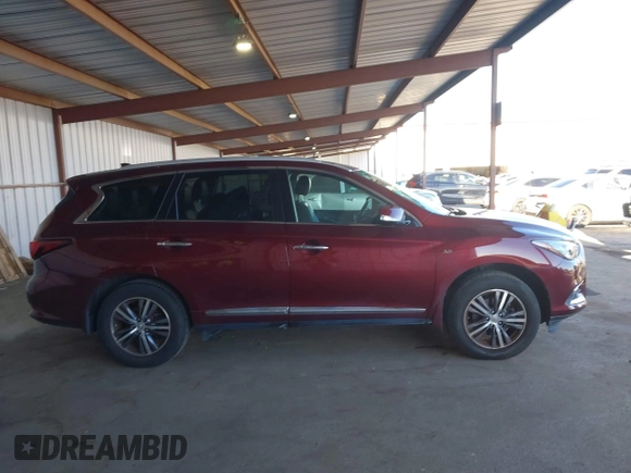 2019 Infiniti QX60 Luxe z VIN 5N1DL0MMXKC506230, wystawiony jako IAAI lot #41922656 z przebiegiem 63 621 mil mil oraz . Historia ofert i sprzedaży dostępna na DreamBid. Obrazek 13.