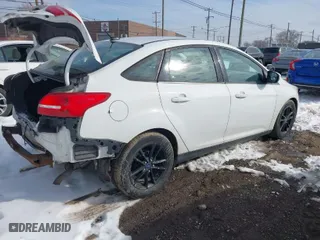 2015 Ford Focus SE with VIN 1FADP3F21FL312736, listed as a IAAI auction lot 41601418 with 137,540 mi miles. Bid and sale history available at carsss.com. Image 4.