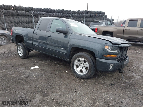 2018 Chevrolet Silverado 1500 LT with VIN 1GCVKREC9JZ200573, listed as a IAAI auction lot 41656239 with 74,000 mi miles. Bid and sale history available at carsss.com. Image 1.