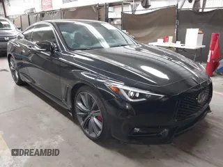 2022 Infiniti Q60 Red Sport 400 with VIN JN1FV7LL4NM680157, listed as a IAAI auction lot 42408607 with 49,060 mi miles and . Bid and sale history available at DreamBid. Image 1.