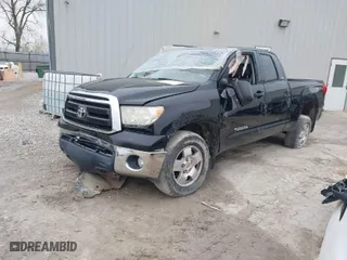 2012 Toyota Tundra 4WD Truck with VIN 5TFUM5F18CX028952, listed as a IAAI auction lot 41497110 with 242,526 mi miles. Bid and sale history available at carsss.com. Image 2.
