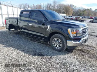 2023 Ford F-150 XL with VIN 1FTFW1E53PKG07088, listed as a IAAI auction lot 41442237 with 21,403 mi miles. Bid and sale history available at carsss.com. Image 1.