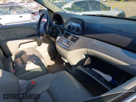 2008 Honda Odyssey EX-L with VIN 5FNRL38718B053448, listed as a IAAI auction lot 40182359 with 164,902 mi miles and . Bid and sale history available at DreamBid. Image 5.