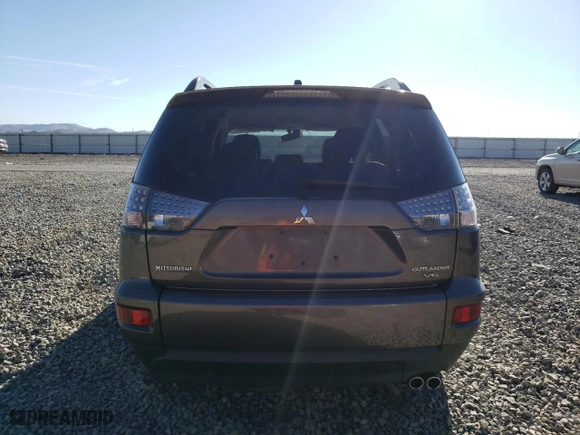 2010 Mitsubishi Outlander XLS with VIN JA4JT4AX8AZ006392, listed as a Copart auction lot 50663555 with 104,172 mi miles and Salvage Title. Bid and sale history available at carsss.com. Image 6.