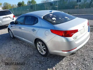 2013 Kia Optima LX with VIN 5XXGM4A79DG199785, listed as a IAAI auction lot 42015820 with 137,202 mi miles. Bid and sale history available at carsss.com. Image 3.