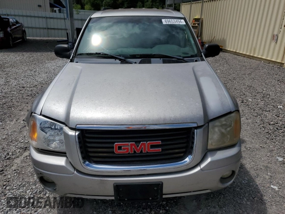 2004 GMC Envoy SLE with VIN 1GKDS13S942119615, listed as a Copart auction lot 69653494 with 141,856 mi miles and Salvage Title. Bid and sale history available at carsss.com. Image 5.