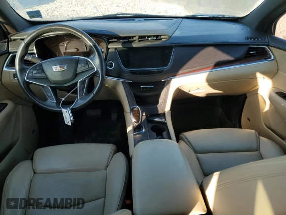 2017 Cadillac XT5 Luxury AWD with VIN 1GYKNDRS8HZ221062, listed as a Copart auction lot 54223415 with 103,791 mi miles and Salvage Title. Bid and sale history available at DreamBid. Image 8.