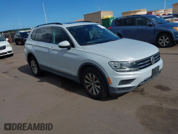 2018 Volkswagen Tiguan SEL z VIN 3VV3B7AX7JM126402, wystawiony jako IAAI lot #42046690 z przebiegiem 54 790 mil mil oraz . Historia ofert i sprzedaży dostępna na DreamBid. Obrazek 1.