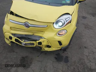 2014 FIAT 500L Trekking z VIN ZFBCFADH1EZ015579, wystawiony jako IAAI lot #42601733 z przebiegiem 185 909 mil mil oraz . Historia ofert i sprzedaży dostępna na DreamBid. Obrazek 6.