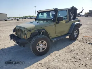 2013 Jeep Wrangler Sport with VIN 1C4AJWAG3DL649487, listed as a Copart auction lot 52568285 with 106,644 mi miles and Salvage title. Bid and sale history available at DreamBid. Image 1.