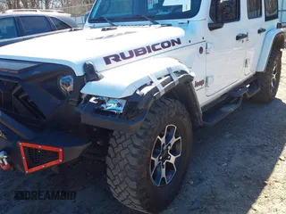 2023 Jeep Wrangler Rubicon with VIN 1C4HJXFG8PW655138, listed as a IAAI auction lot 41674959 with 40,790 mi miles and . Bid and sale history available at DreamBid. Image 6.