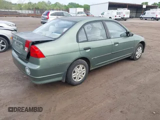2004 Honda Civic VP with VIN 1HGES16374L014278, listed as a IAAI auction lot 42088847 with 219,022 mi miles. Bid and sale history available at carsss.com. Image 4.