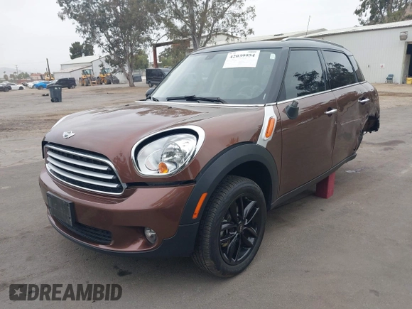 2013 MINI Countryman with VIN WMWZB3C56DWM09484, listed as a IAAI auction lot 42039954 with 37,264 mi miles and . Bid and sale history available at DreamBid. Image 2.