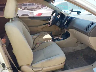 2004 Honda Civic LX with VIN 1HGEM21584L029865, listed as a IAAI auction lot 41488497 with 189,493 mi miles. Bid and sale history available at carsss.com. Image 5.