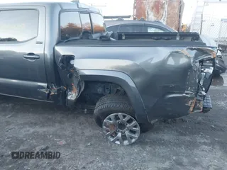 2017 Toyota Tacoma SR5 with VIN 3TMCZ5AN4HM104459, listed as a IAAI auction lot 41207997 with 80,103 mi miles and . Bid and sale history available at DreamBid. Image 6.