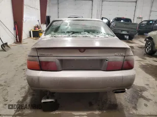 1998 Cadillac Seville STS z VIN 1G6KY5490WU916771, wystawiony jako Copart lot #58699555 z przebiegiem 129 944 mil mil oraz Nie do naprawy. Historia ofert i sprzedaży dostępna na DreamBid. Obrazek 6.
